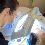 Jennifer Turner performing electrolysis hair removal treatment using Apilus technology at Turn Beautiful clinic.